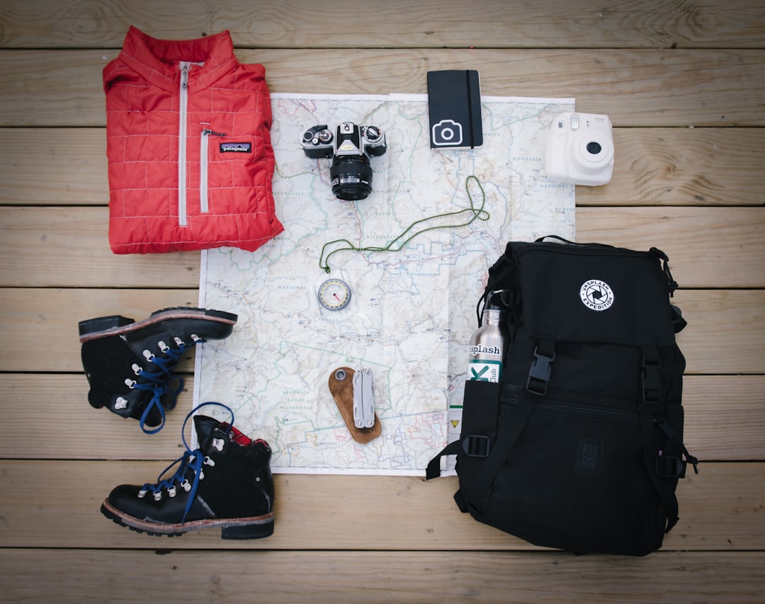 Cover illustration for bikepacking gear checklist with a loaded gravel bike at sunrise