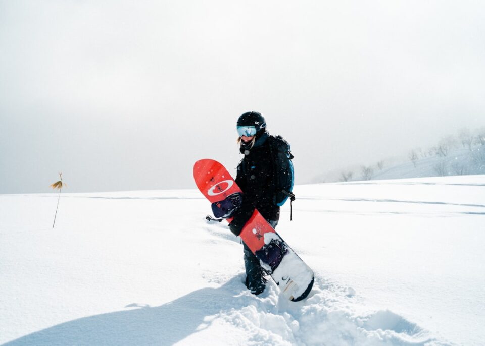 Snowboarding for Beginners on a gentle mountain slope at sunrise